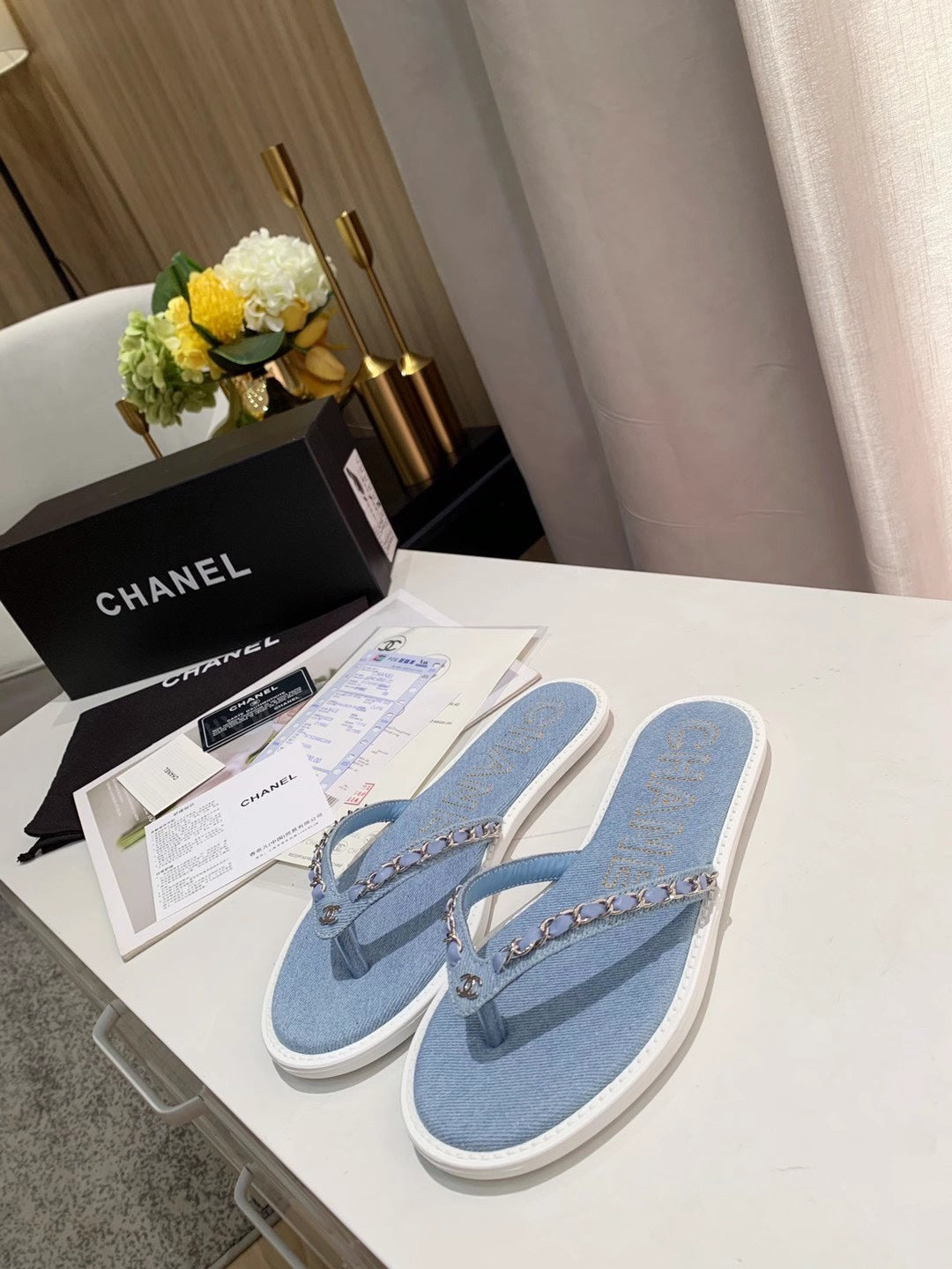 CHANEL THONG SLIPPERS IN LIGHT BLUE DENIM