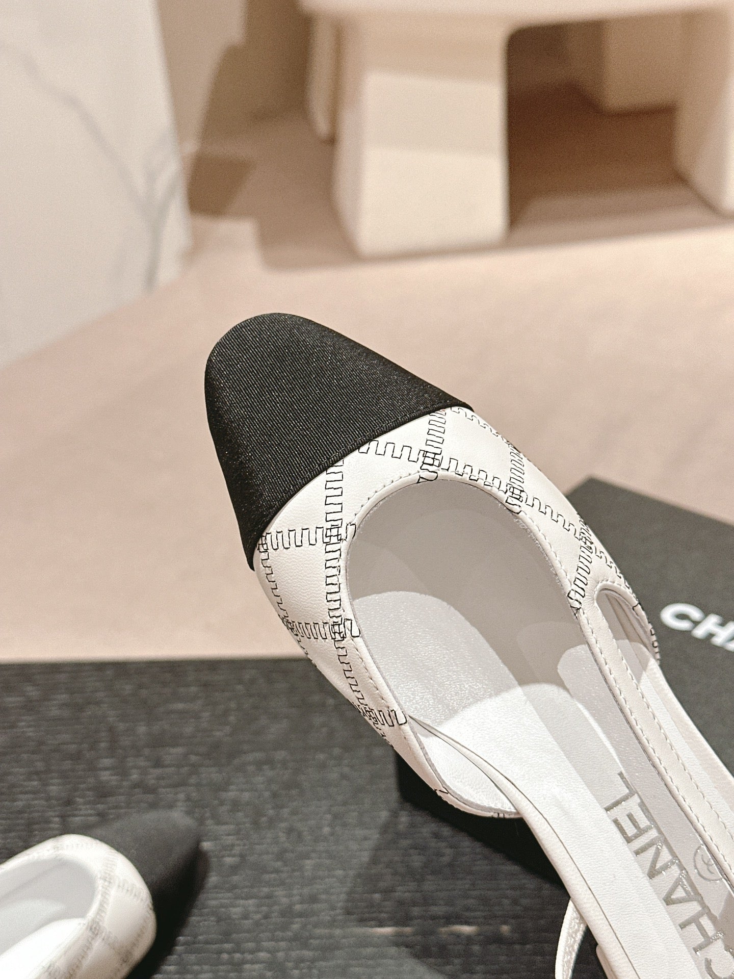 CHANEL SLINGBACKS IN WHITE LAMBSKIN AND BLACK SATIN